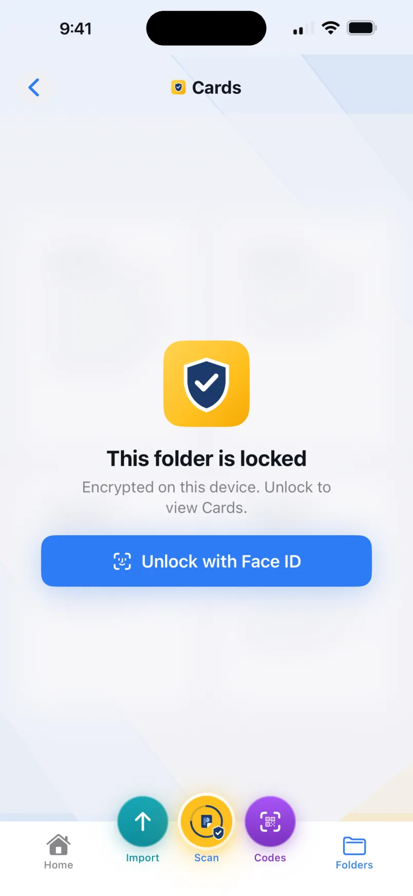 A locked, encrypted folder in PaperKeep prompting to unlock with Face ID